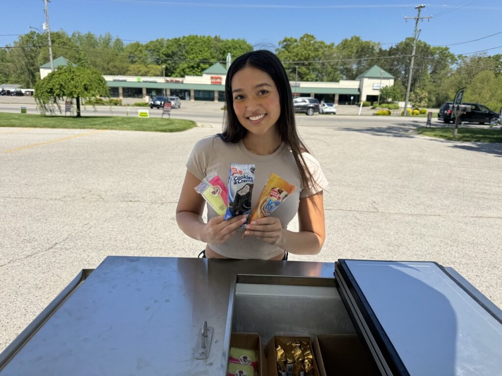 Girl with ice cream from ice cream cart rental Florida