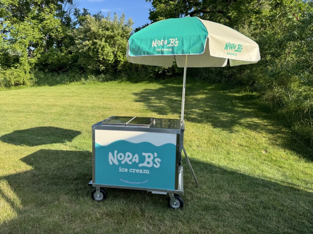 Ice cream cart with umbrella rental